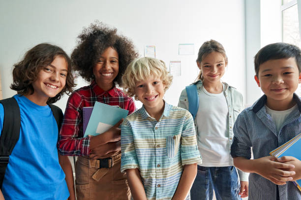 A diverse group of children smiling together